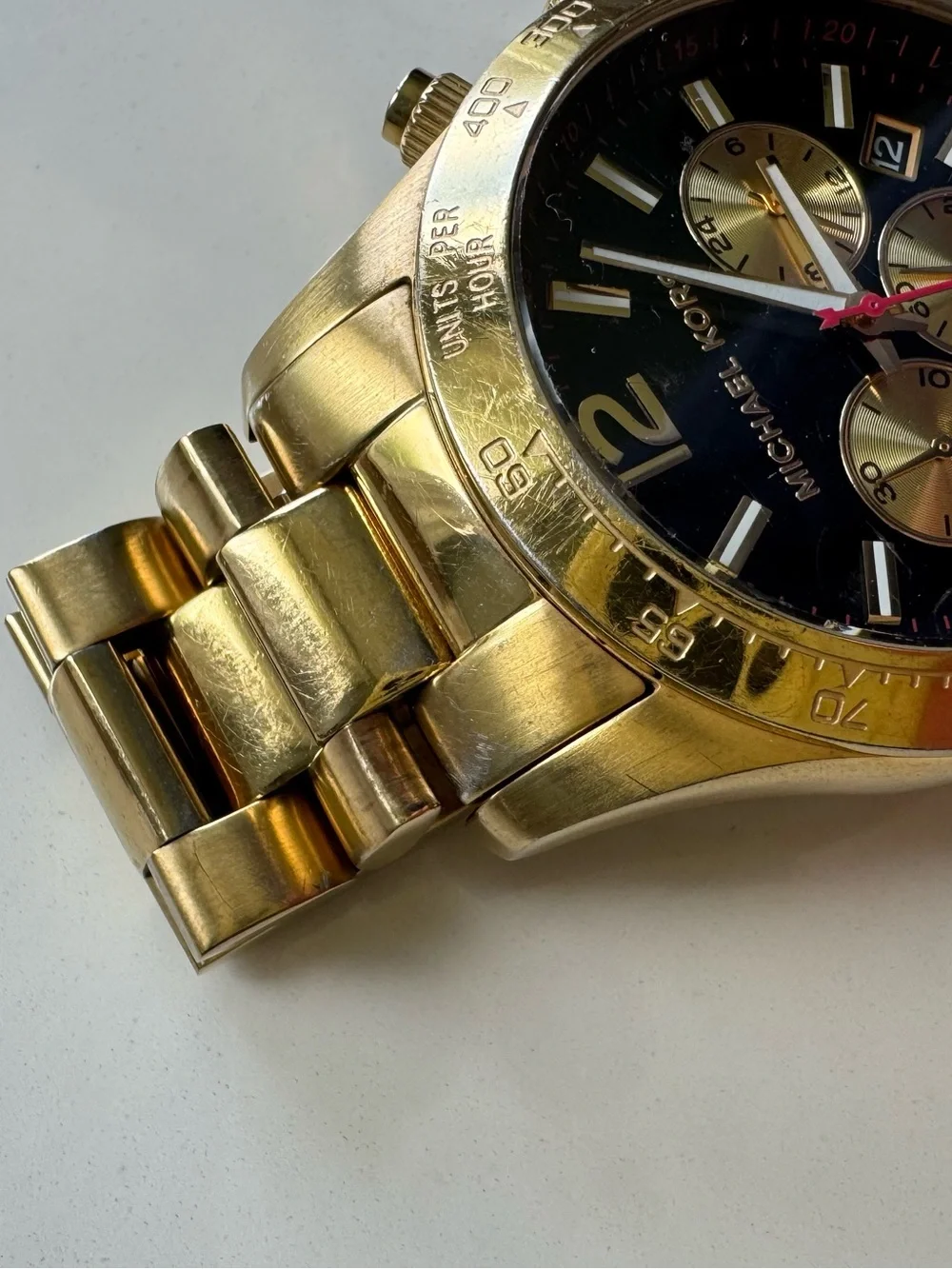 Michael Kors Gold and Black Chronograph Watch with Red Accent